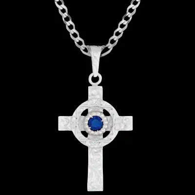 A custom silver celtic cross pendant necklace for men and women, western-inspired design. featuring blur zirconia stone 